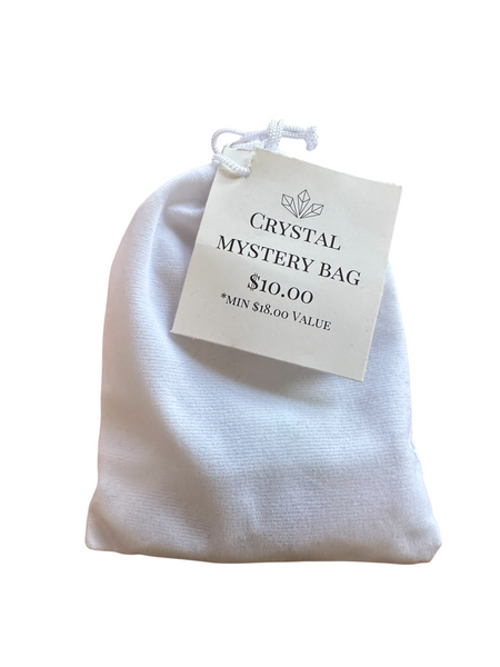 Kelowna Crystal Cave - White drawstring bag with a 'Crystal Mystery Bag' tag on a white background