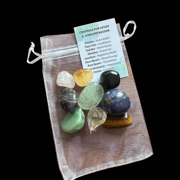 My Two Daughters Jewelry - Set of crystals in a drawstring bag with a label on a black background