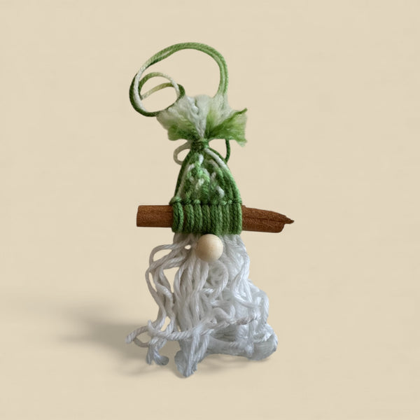 Blazin Creationz - Small decorative gnome figure with green hat and white beard on a beige background