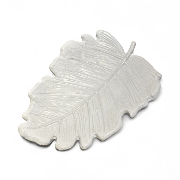 TRUE ART KELOWNA - White concrete leaf-shaped dish on a white background