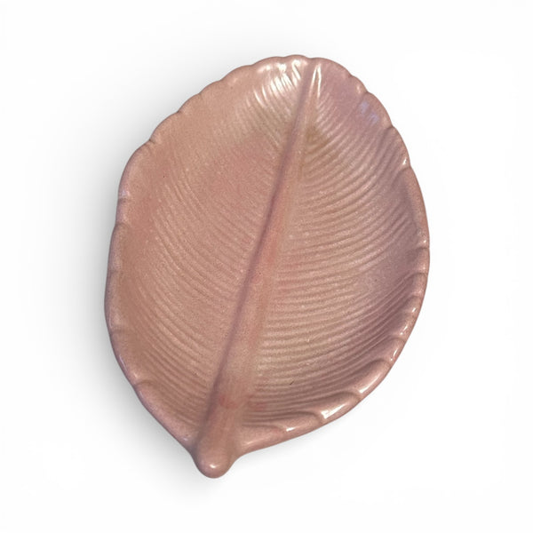 My Two Daughters Jewelry - Pink leaf-shaped object on a white background