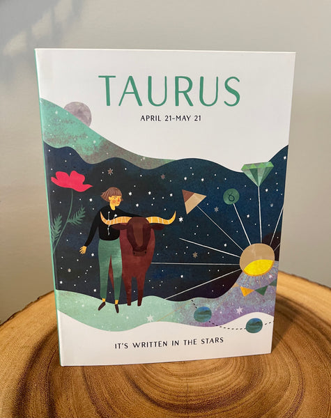TRUE ART KELOWNA - A book cover for 'Taurus' with an illustration that includes a person, a bull, and celestial bodies against a starry night background.